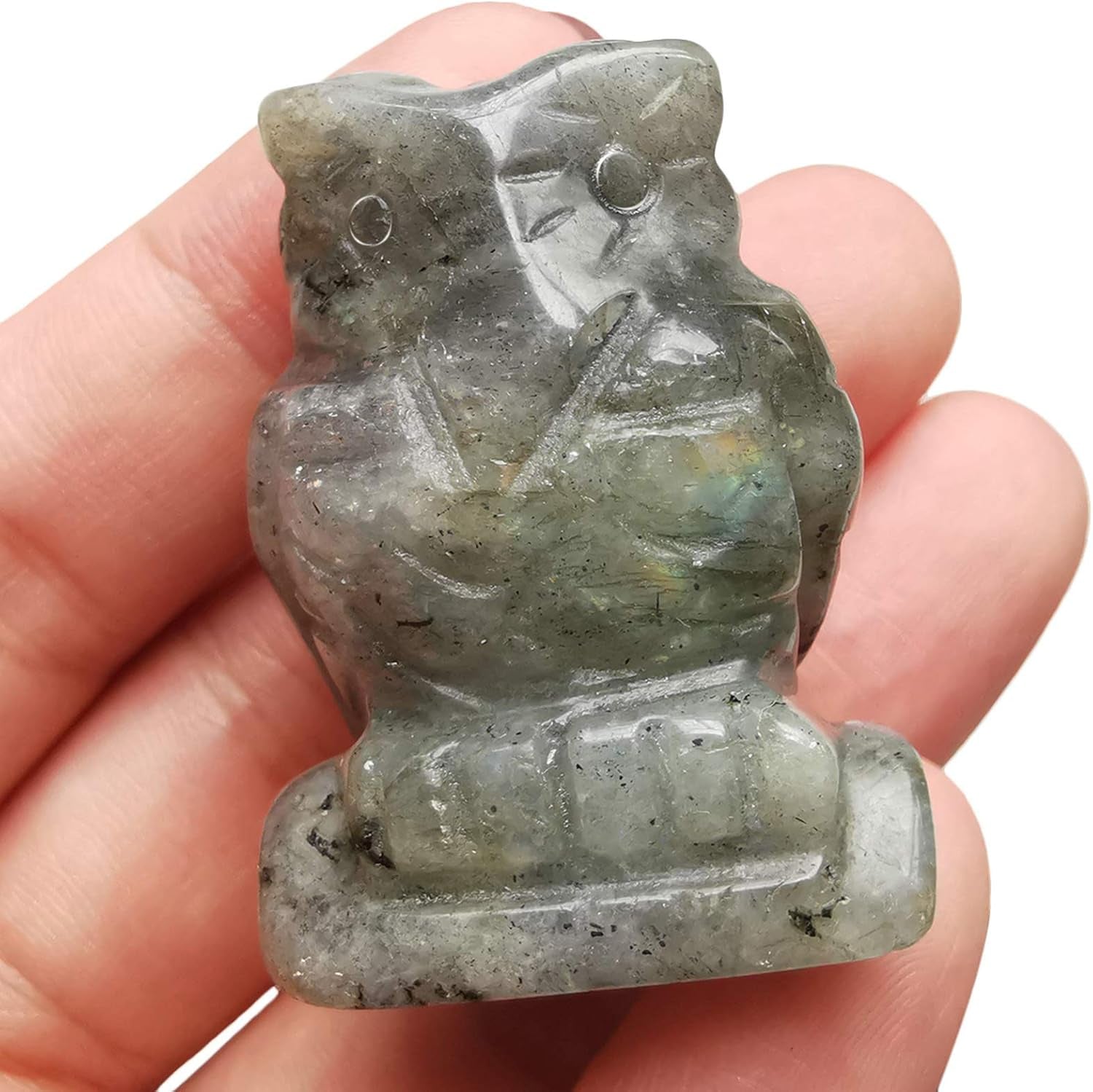 small moonstone owl figurine carved from crystal
Hand-carved moonstone owl for intuition and peace.
what are the spiritual benefits of moonstone?  
spirit animal
